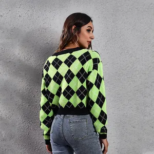 Detailed back view of a lime green and black argyle pattern cropped knit cardigan for women.