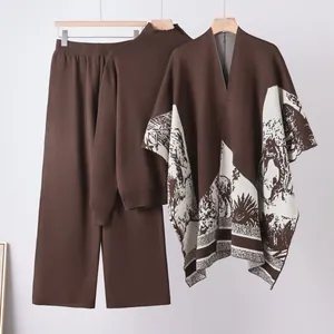 Elegant 3-piece knit set for women with turtleneck sweater, pants and printed shawl.
