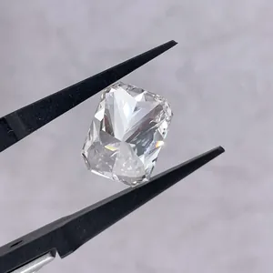 Radiant-cut lab-grown diamond held in black tweezers for HPHT CVD jewelry wholesale