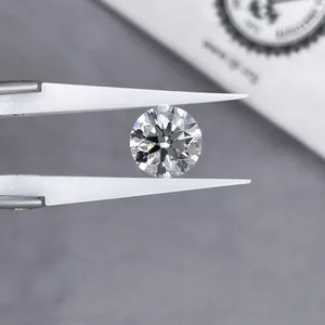 1.5 carat round brilliant cut lab grown diamond held in tweezers with IGI certificate