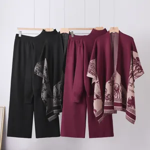 Elegant women's 3-piece knitted set featuring mock neck sweater, wide-leg pants and shawl