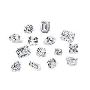 Selezione di diamanti coltivati in laboratorio in varie forme, tra cui cuore e smeraldo.