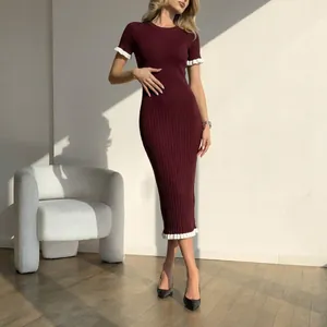 Elegant burgundy rib-knit bodycon midi dress featuring contrast white ruffle trim on sleeves