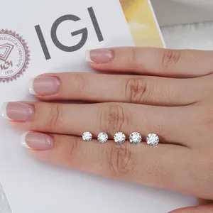 Five brilliant round cut lab-grown diamonds D color VVS clarity presented on an IGI certificate