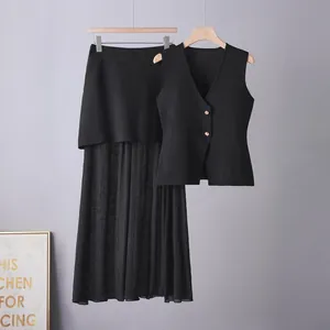 Elegant black two-piece women's set with knit vest and pleated midi skirt