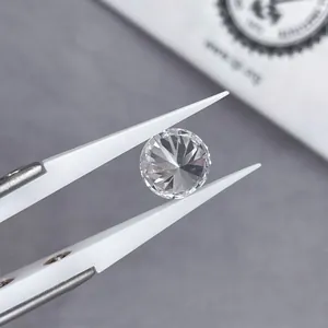 1.5 Carat lab-grown round brilliant cut diamond held with professional tweezers