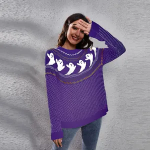 Detail shot of purple Halloween ghost knit sweater featuring vintage polka dots and loose fit