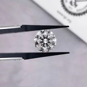 Round brilliant cut lab grown diamond loose stone held with professional jewelry tweezers