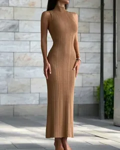 Elegant sleeveless high-neck ribbed knit bodycon maxi dress in camel brown color.