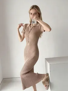 Full-body view of a chic beige short-sleeve polo collar ribbed knit maxi dress