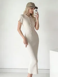 Full view of the slim fit cream polo neck short sleeve ribbed knit dress on model