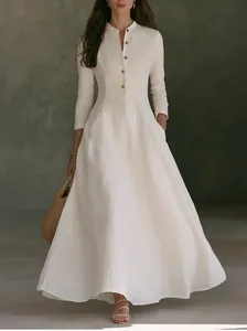 Elegant white long-sleeve linen maxi dress with mandarin collar and vintage French style