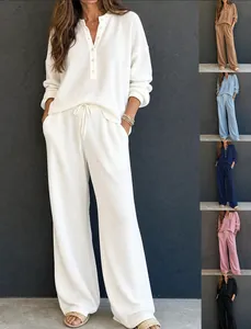 Detail of women's waffle knit Henley collar lounge set showing multiple color options