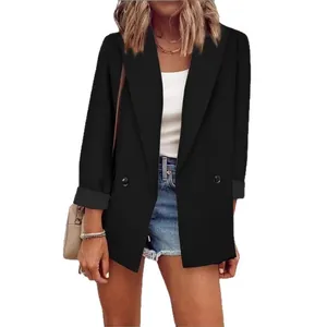 Professional black double-breasted blazer for women, ideal for office and commuter wear.