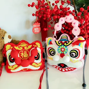 Detailed view of cute plush lion crossbody bags with festive holiday decorations