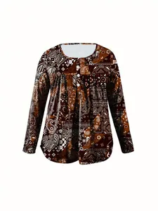 Women's loose paisley print long sleeve top with buttoned round neck in brown tones.