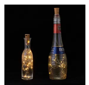 Detailed view of LED wine bottle cork string lights inside glass bottles
