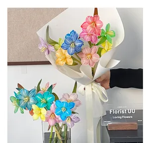 Vibrant multi-colored flower bouquet treated with floral dyes in a florist setting