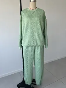 Full view of women's mint green cable knit two-piece set with long sleeve top and pants