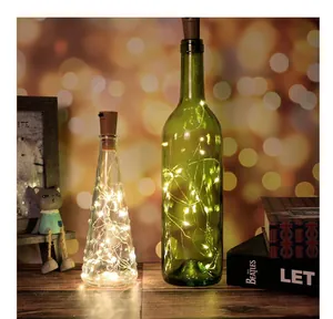 Warm white LED cork string lights glowing inside glass bottles for cozy room decor