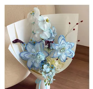 Beautiful close-up of dyed blue and white bouquet showing flower absorption dye effect