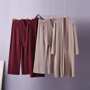 Detailed view of the 3-piece soft knit set featuring cardigan, vest, and wide pants