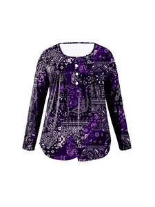 Detailed view of women's purple paisley print long-sleeve top with button neck