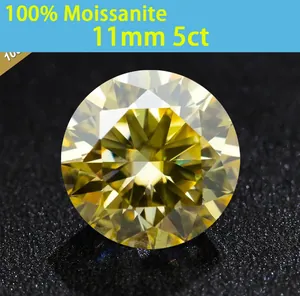 Close-up of 5ct round brilliant cut yellow Moissanite gemstone on black surface