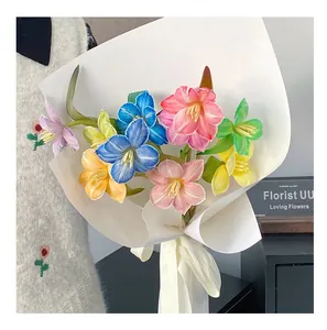 Detailed view of vibrant multi-colored flowers dyed with professional flower coloring agent