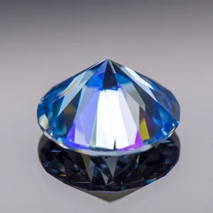 Detailed close-up showing the fire of a brilliant round-cut ice blue moissanite