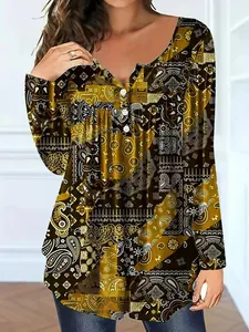 Detailed view of bohemian paisley print on women's V-neck button long sleeve top