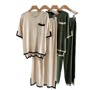 Two-piece knit set featuring a short-sleeve top and matching wide-leg pants for women