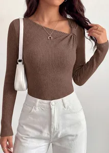 Detail shot of a brown slim fit ribbed knit top with a unique asymmetric knot neckline.