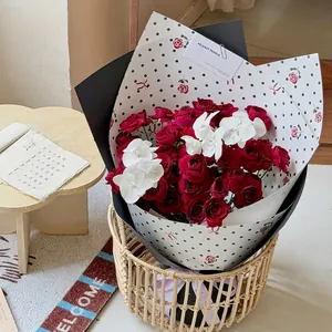 Creative polka dot and rose pattern flower wrapping paper for elegant florist bouquets