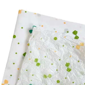 Papier de soie blanc avec pois et nœuds verts pour l'emballage de fleurs style doux