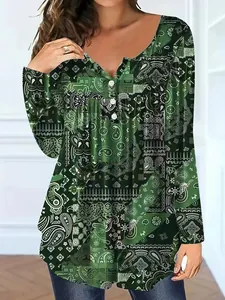 Detailed front view of women's green paisley print v-neck long sleeve top with buttons