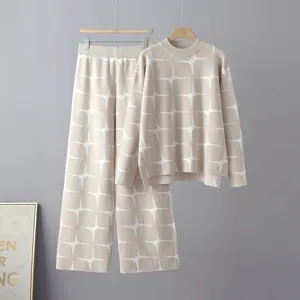 Detailed view of women's knitted two-piece set with starburst jacquard pattern.
