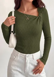 Detail view of dark green ribbed knit top with asymmetrical neck and knot decoration