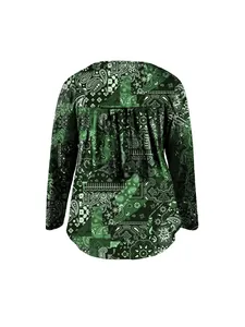 Back view of women's green paisley print long sleeve top with pleats and curved hem