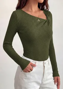 Close-up detail of olive green rib-knit top with asymmetric twisted neckline design.