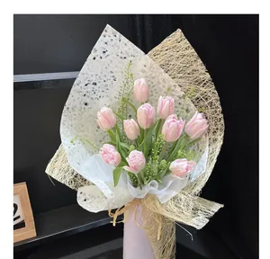 Detail shot of white mesh flower wrapping paper with textured fiber for florist DIY use.
