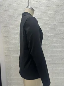 Side view detail of a sleek black long-sleeved tailored blazer for women.