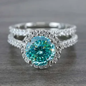 Detailed view of a luxurious 1 carat cyan moissanite halo ring in S925 silver set