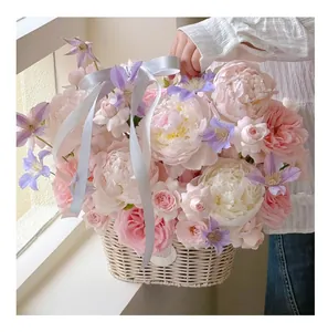 Handcrafted pure white woven rattan flower basket for elegant floral arrangements