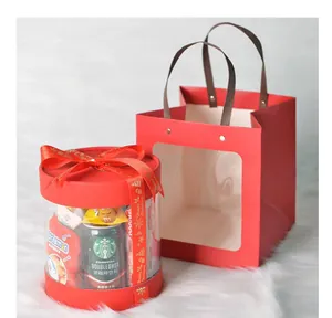 Red New Year gift bag and transparent circular window box set for souvenirs