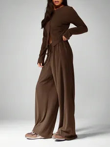 Full detail view of women's elegant brown long sleeve cardigan and wide leg lounge pants set