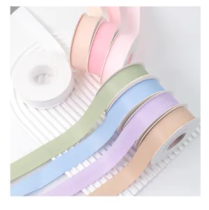 Macro view of multi-colored matte silk ribbons for floral and gift box decoration