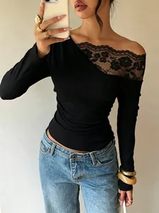 Detailed view of black French lace splicing on a slim fit off-the-shoulder long sleeve top