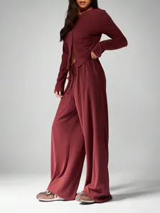 Detail view of women's burgundy 2-piece loungewear set with cardigan and wide-leg pants