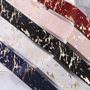 2.5cm marble pattern satin ribbons with gold accents for gift wrapping and DIY crafts